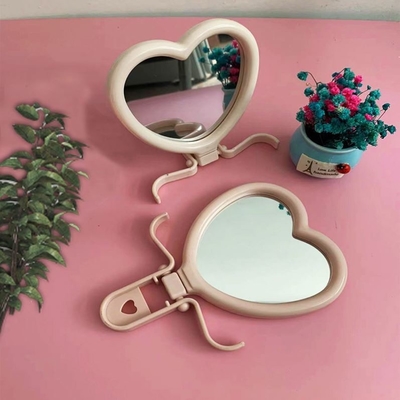 Mujer vestimenta en forma de corazón bolsillo maquillaje ajustable compacto mini espejo con calidad
