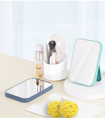 Espejo de maquillaje portátil y mesa de baño con diseño compacto