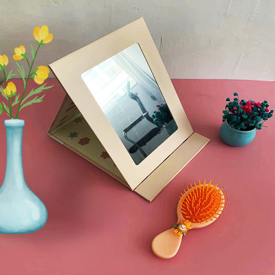 Papel revestido y espejo de vidrio La combinación ideal para un lindo espejo plegable de maquillaje